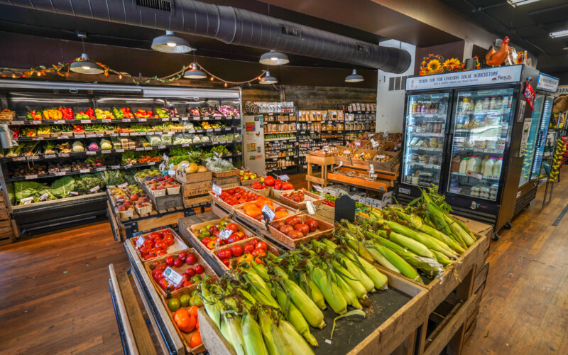 Fresh, local produce, dairy, eggs, and more from all over the greater Ann Arbor area is available at the Argus Farm Stop. A dairy case, fresh produce, and more local goods on display.