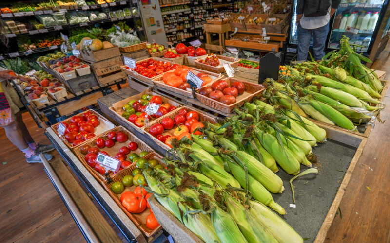 Locally grown corn, tomatoes, and other farm-crafted products are for sale at the Argus Farm Stop. Corn on the cob and tomatoes for sale at Argus Farm Stop.