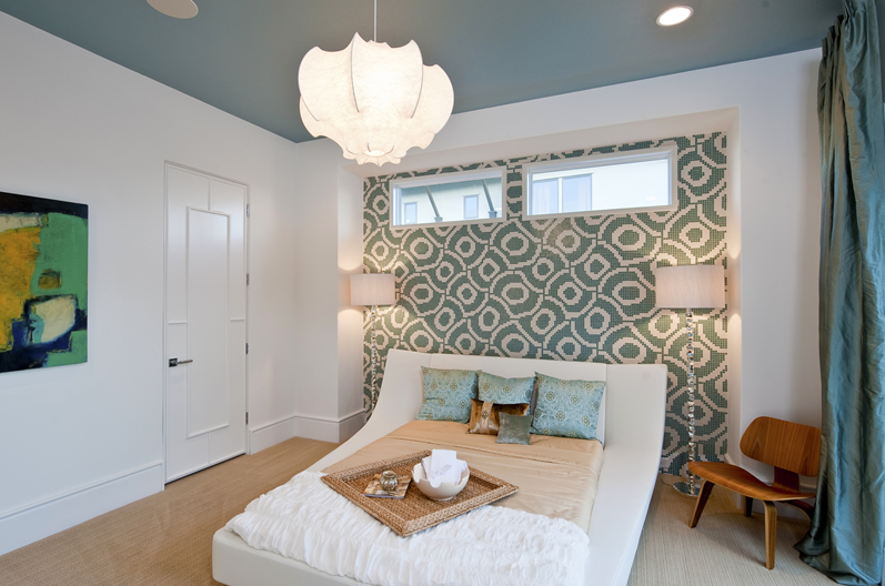 bedroom-with-beautiful-pendant-lamp-and-blue-wall-feature