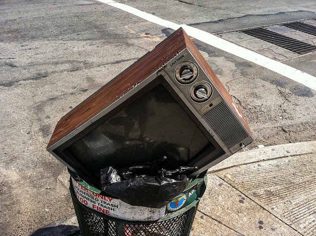 TV in trash can